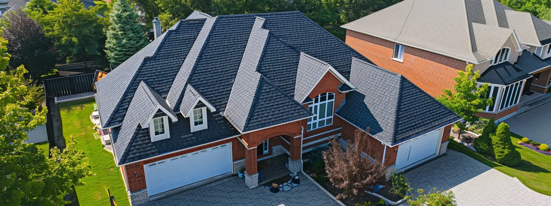 a birds eye view of a neigborhood roofing